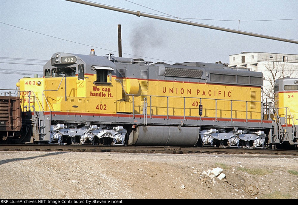 Union Pacific SD24 UP #402 teamed with slug S-4